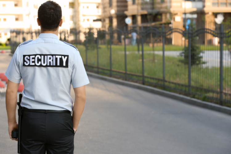 Defender One Security Guard at a glass door